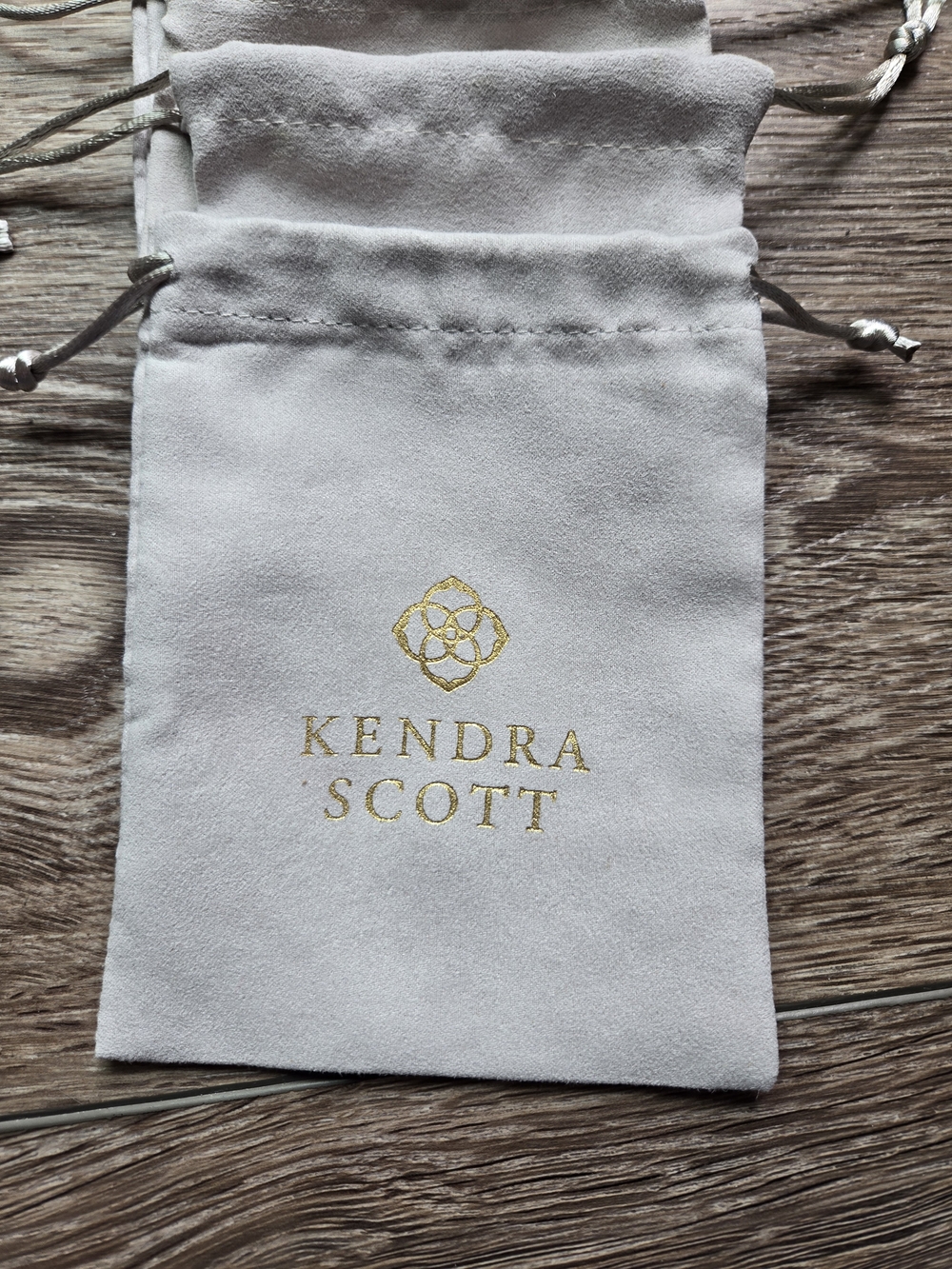 Kendra Scott Light Gray Drawstring Jewelry Pouches with Gold Logo (Set) - Picture 3 of 4